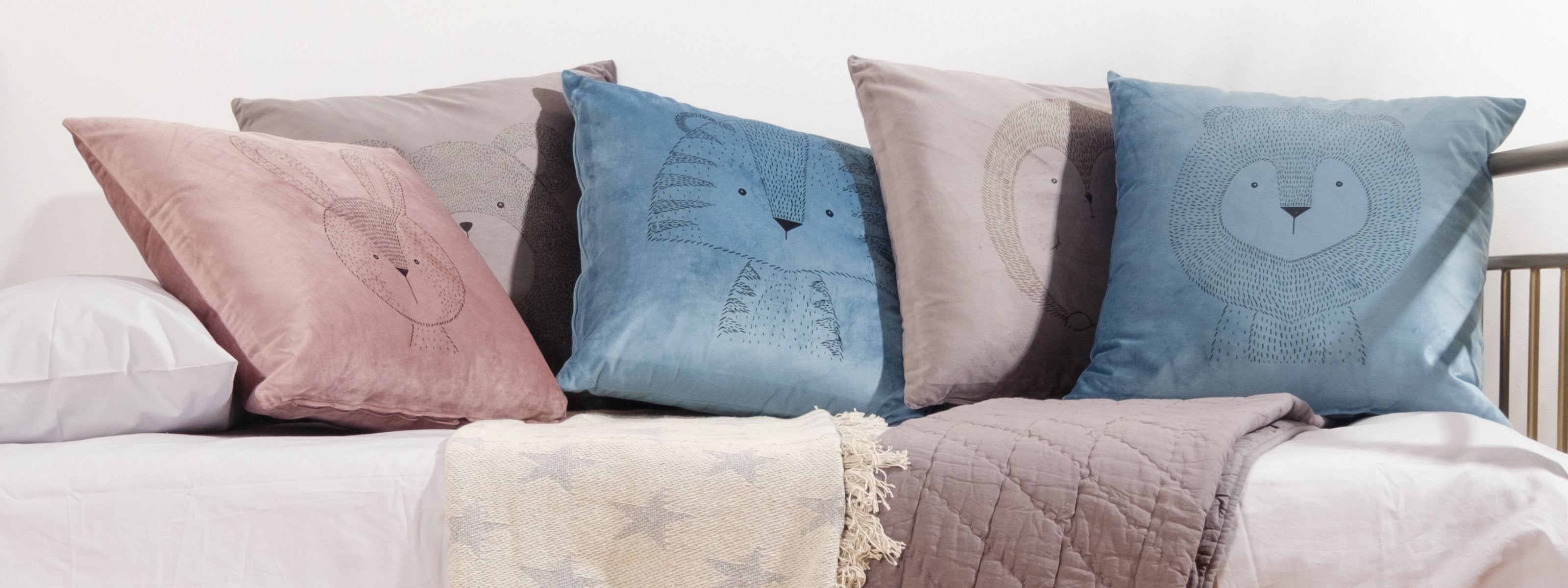 scatter cushions on a bed